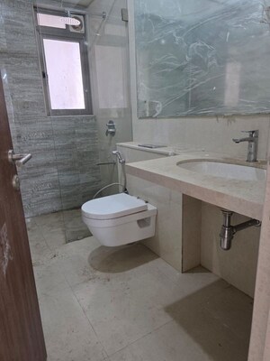 Bathroom in 3 BHK Apartment at T Bhimjyani Neelkanth Woods, Manpada – for Sale