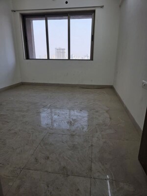 Room in 3 BHK Apartment at T Bhimjyani Neelkanth Woods, Manpada – for Sale