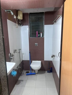 Bathroom in 1 BHK Apartment at Manavsthal Heights, Andheri East – for Rent