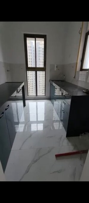 Kitchen in 2 BHK Apartment at Raymond Ten X Habitat, Pokhran Road No Two – for Rent