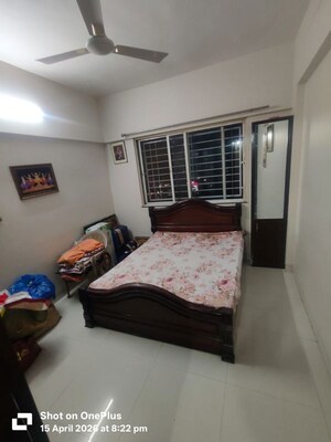 Bedroom in 2 BHK Apartment at Ranade Yashodhan, Mayur Colony – for Rent