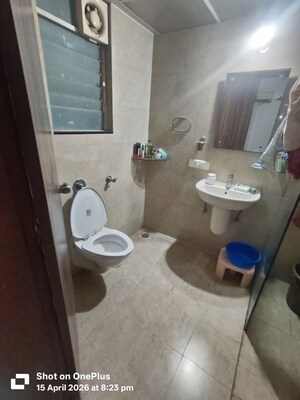 Bathroom in 2 BHK Apartment at Ranade Yashodhan, Mayur Colony – for Rent