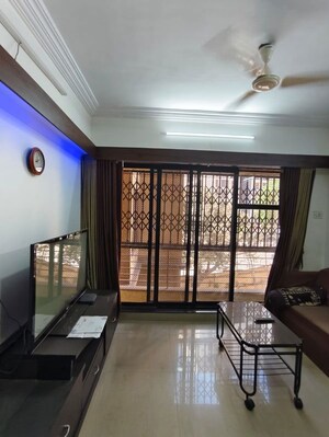 Living Room in 2 BHK Apartment at Lalani Residency, Kavesar – for Rent