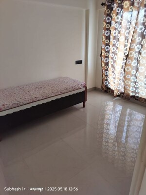 Bedroom in 3 BHK Apartment at Pranjee Garden City Phase 2, Katrap – for Rent