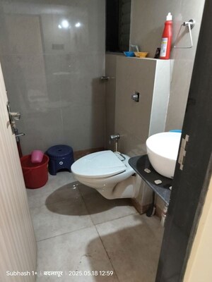 Bathroom in 3 BHK Apartment at Pranjee Garden City Phase 2, Katrap – for Rent