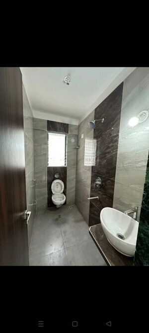 Bathroom in 3 BHK Apartment at Suyog CHS Naupada, Naupada – for Rent