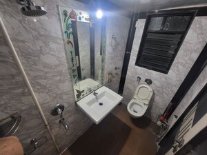 Bathroom in 3 BHK Apartment at Atul Blue Meadows, Andheri East – for Rent