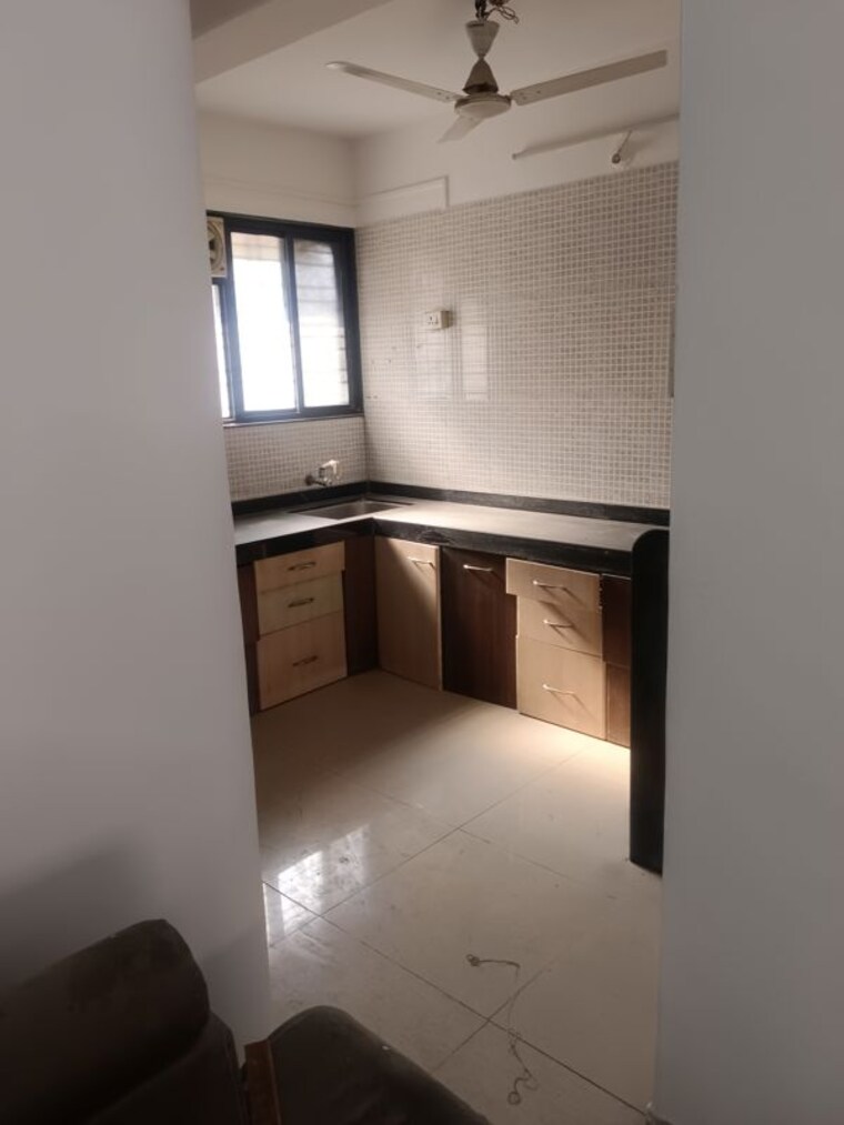 Kitchen, nageshwar-chs-somwar-peth 3.5 Bedroom 1200 Sq.Ft. Apartment In Somwar Peth Pune 10309239