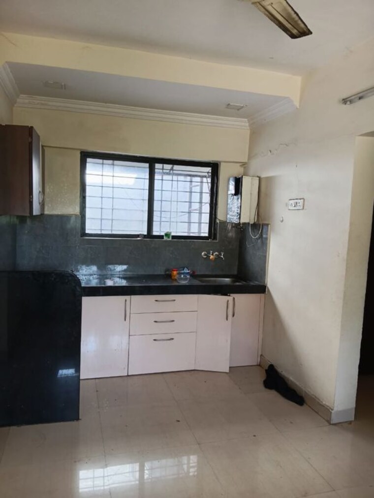 Kitchen, astha-baner 2 Bedroom 850 Sq.Ft. Apartment In Baner Pune 10309322