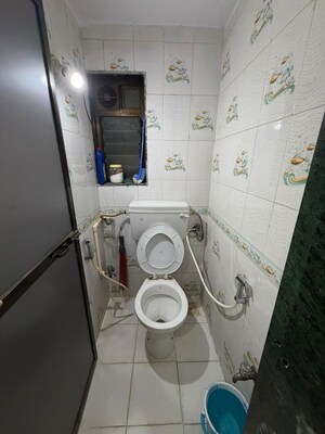 Bathroom in 1 BHK Apartment at Aastha CHS Sion, Sion – for Rent