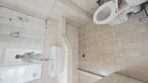 Bathroom in 2.5 BHK Apartment at Eldeco Green Meadows, Pi Greater Noida – for Sale