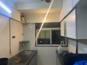 Kitchen in 2 BHK Apartment at Neelyog Virat, Malad East – for Rent