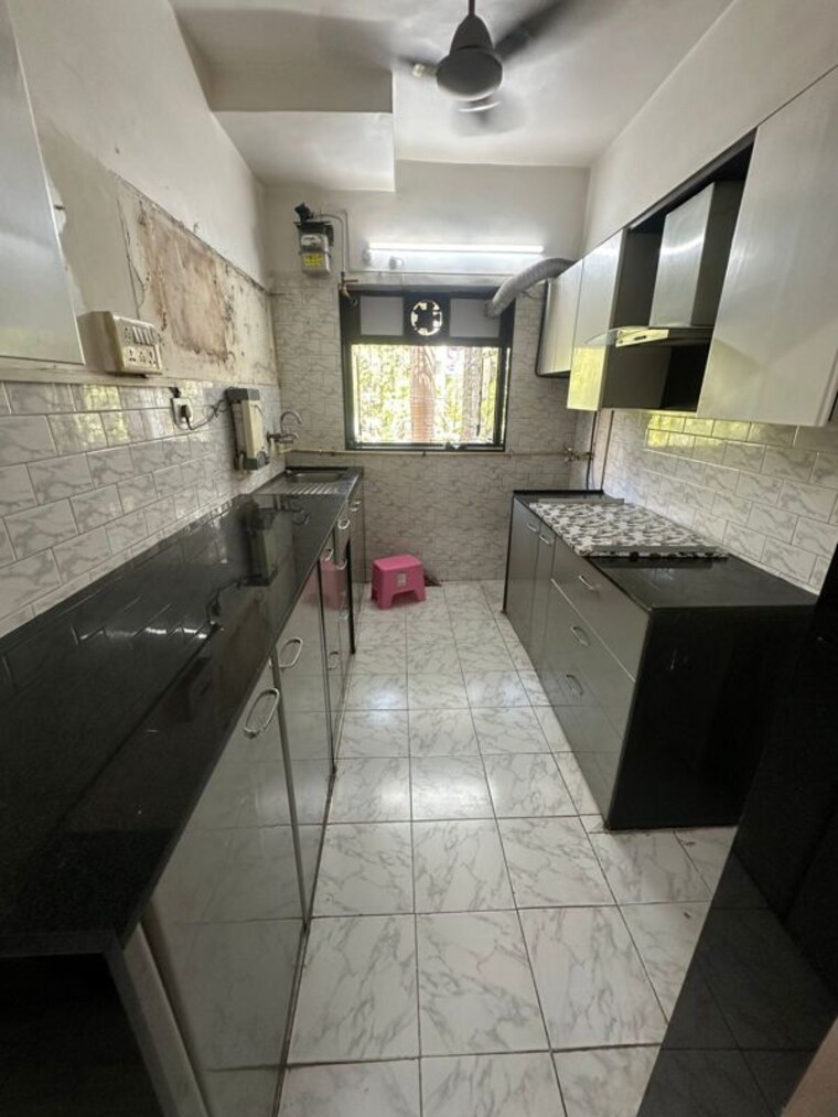 Kitchen, seven bunglow 1 Bedroom 600 Sq.Ft. Apartment In Seven Bunglow Mumbai 10309464