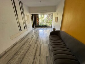 Living Room in 1 BHK Apartment at Seven Bunglow – for Rent