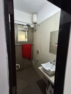 Bathroom in 1 BHK Apartment at Rockline The Meridian Towers, Ghatkopar West – for Rent
