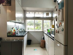 Kitchen in 2 BHK Apartment at Juhu Sangeeta CHS, Khar West – for Rent