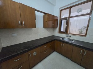Kitchen in 2 BHK Apartment at CGHS Group Hewo Apartments, Sector 56 – for Rent