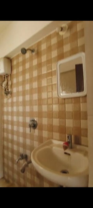 Bathroom in 1 BHK Apartment at Raunak Delight, Owale – for Rent