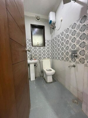 Bathroom in 2 BHK Apartment at Chattarpur – for Rent