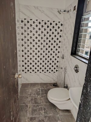 Bathroom in 1 BHK Apartment at UK Iridium, Kandivali East – for Rent