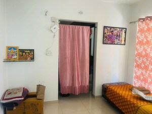 Living Room in 1 BHK Apartment at Shapoorji Pallonji Joyville Hinjewadi, Hinjewadi – for Rent