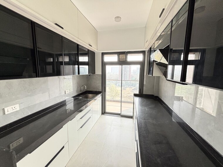 Kitchen, adani-atelier-greens 3 Bedroom 1966 Sq.Ft. Apartment In Koregaon Park Pune 10309704