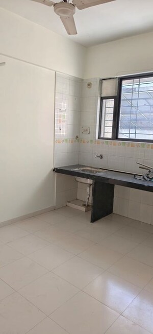 Kitchen in 1.5 BHK Apartment at Nirman Rutugandh Apartment, Wadgaon Sheri – for Rent