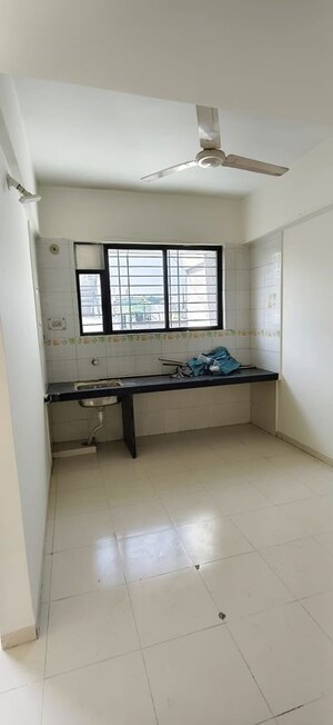 Kitchen in 1.5 BHK Apartment at Nirman Rutugandh Apartment, Wadgaon Sheri – for Rent