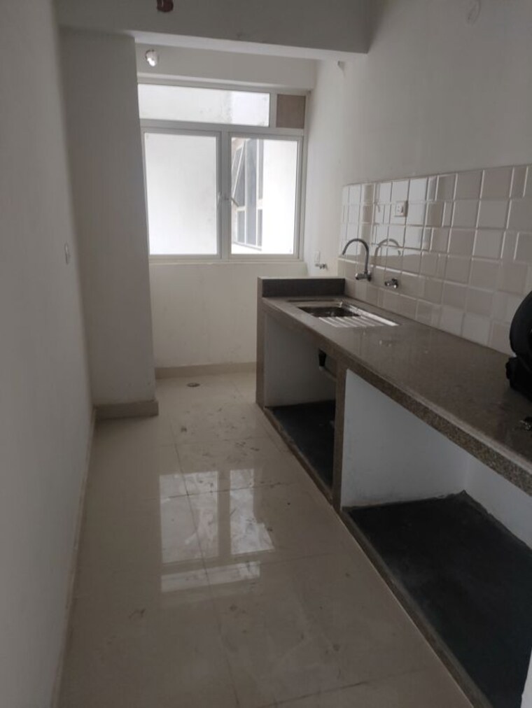 Kitchen, rishi-pranaya-phase-i 3 Bedroom 1221 Sq.Ft. Apartment In Rajarhat New Town Kolkata 9984113