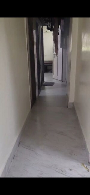 Building Lobby in 2 BHK Apartment at Milap CHS, Andheri West – for Rent