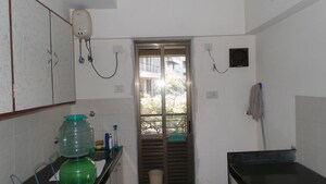 Kitchen in 1.5 BHK Apartment at Juhu Green Apartment, Juhu – for Rent