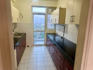 Kitchen in 3 BHK Apartment at Emaar Gurgaon Greens, Sector 102 – for Rent