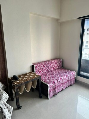 Bedroom in 2 BHK Apartment at Millie Enclave, Malad West – for Rent