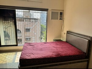 Bedroom in 2 BHK Apartment at Millie Enclave, Malad West – for Rent