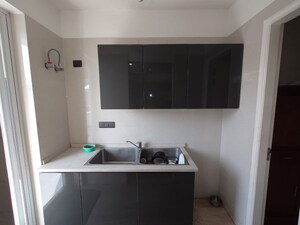 Kitchen in 3 BHK Builder Floor at RPS Palm Drive, Sector 88 – for Rent