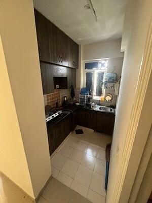Kitchen in 2 BHK Apartment at Shree Vardhman Mantra, Sector 67 – for Rent