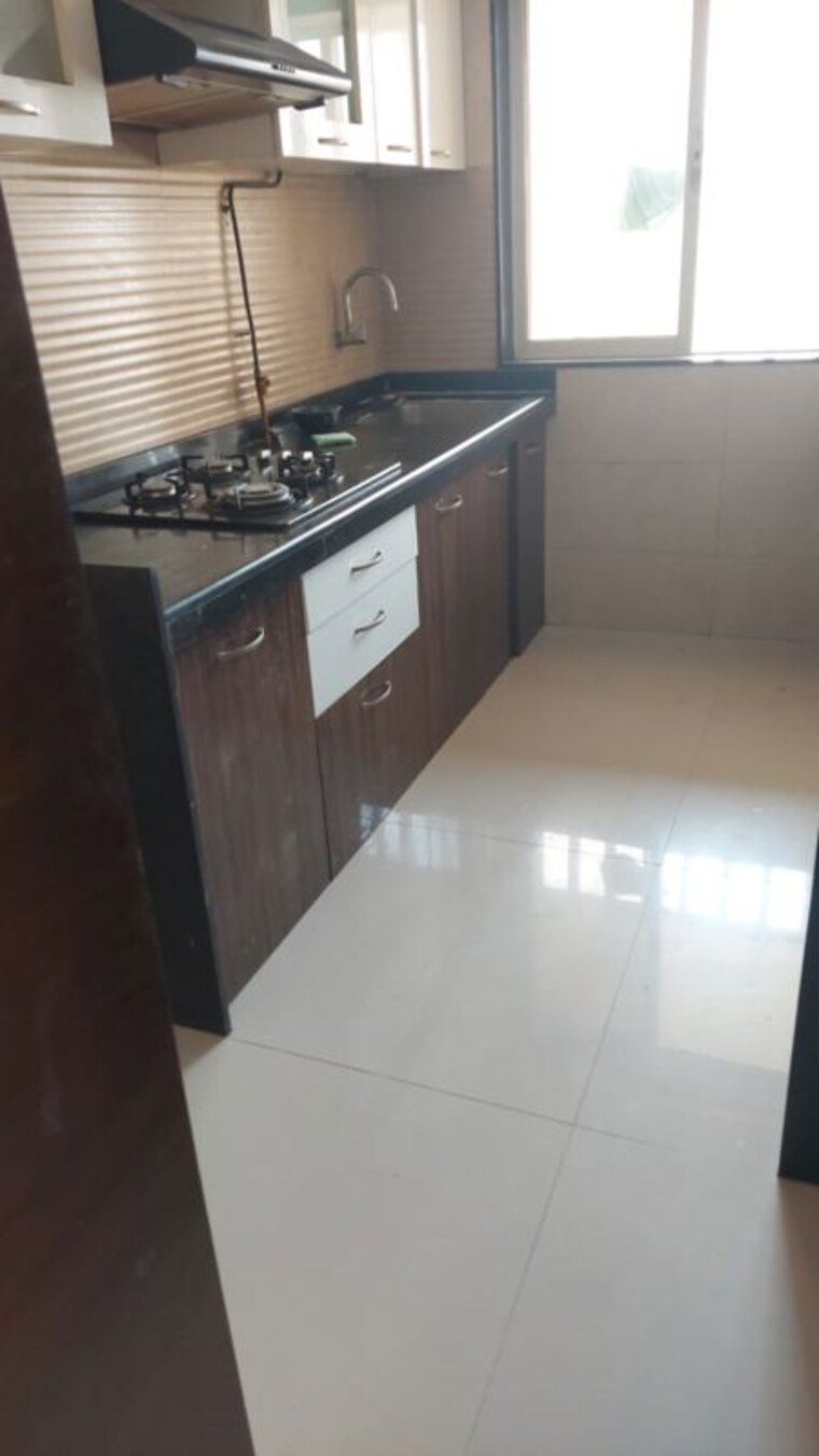 Kitchen, romell-diva 2 Bedroom 1100 Sq.Ft. Apartment In Malad West Mumbai 10310482