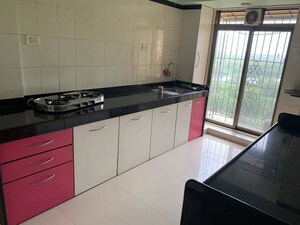 Kitchen in 2 BHK Apartment at Whispering Heights, Malad West – for Sale