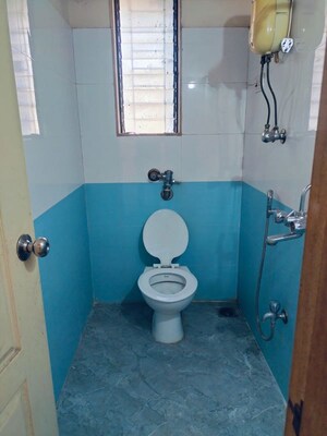 Bathroom in 1 BHK Apartment at Swastik Palms CHS, Brahmand – for Rent