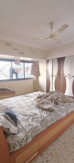 Bedroom in 1 BHK Apartment at Asmita Jyoti CHS, Malad West – for Rent