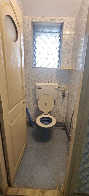 Bathroom in 1 BHK Apartment at Asmita Jyoti CHS, Malad West – for Rent
