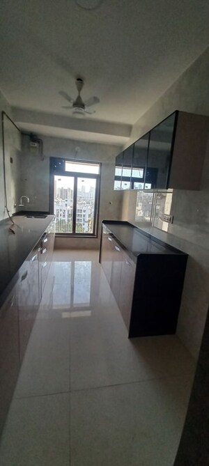 Kitchen in 3 BHK Apartment at Vaishno Sky, Malad East – for Rent