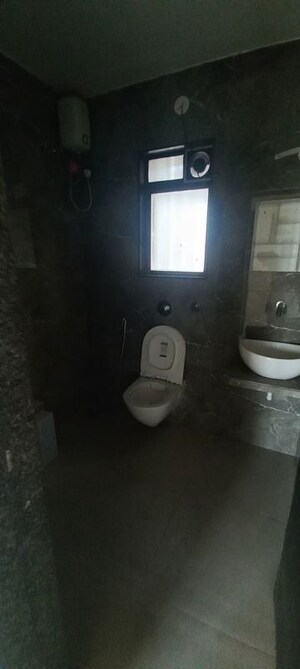 Bathroom in 3 BHK Apartment at Vaishno Sky, Malad East – for Rent