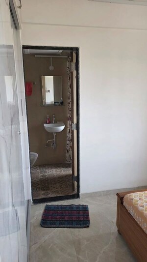 Bathroom in 1 BHK Apartment at Nakul Raj , Malad West – for Rent