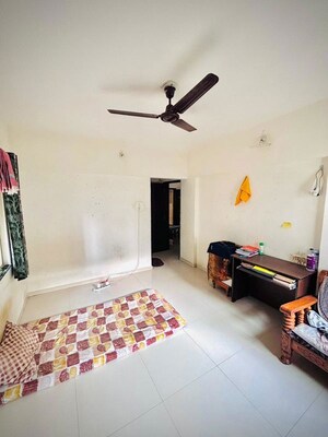 Living Room in 2 BHK Apartment at Dhayari – for Sale