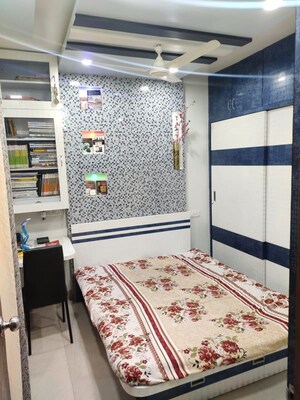 Bedroom in 2 BHK Apartment at Samarth Puram CHS, Shivane – for Rent