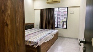 Bedroom in 2 BHK Apartment at Acme Enclave, Malad West – for Rent