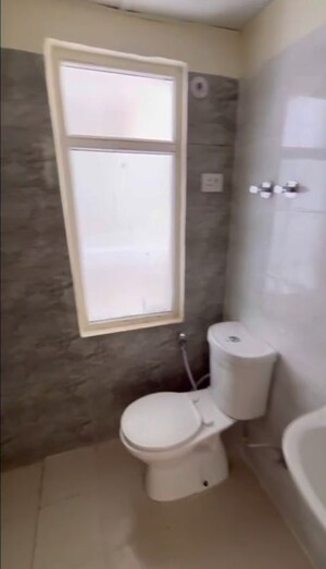 Bathroom in 2 BHK Apartment at Amrapali Enchante, Tech Zone 4 Greater Noida – for Sale