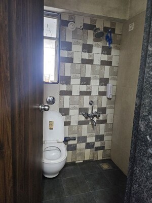 Bathroom in 2 BHK Apartment at Zinnia Elegance, Wakad – for Sale