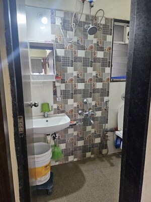 Bathroom in 2 BHK Apartment at Zinnia Elegance, Wakad – for Sale